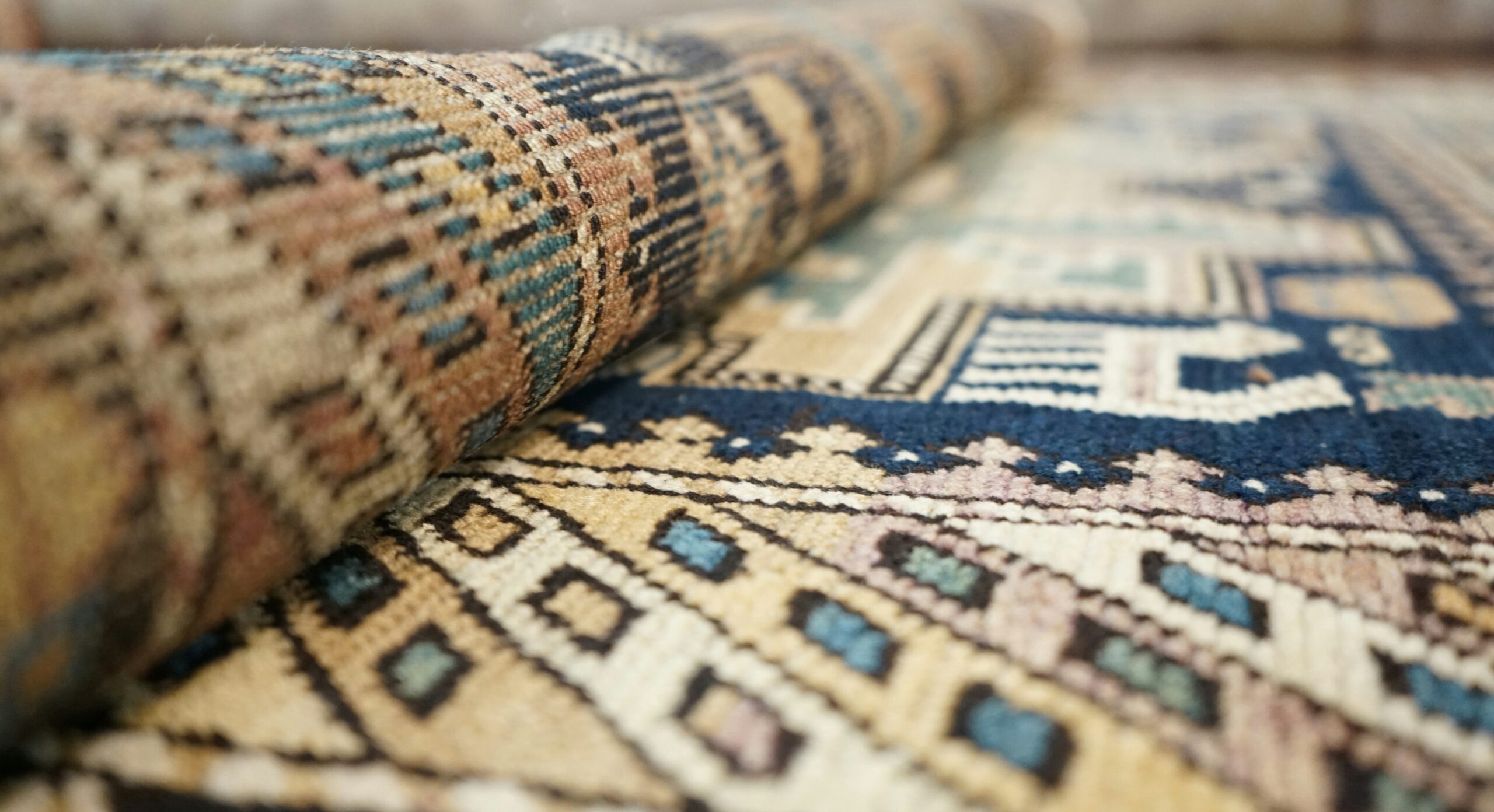 Gold and blue oriental rug cleaned by Pro-Care of Cookeville